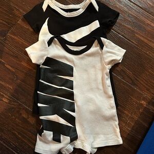2, 6-12 month Nike Onesies